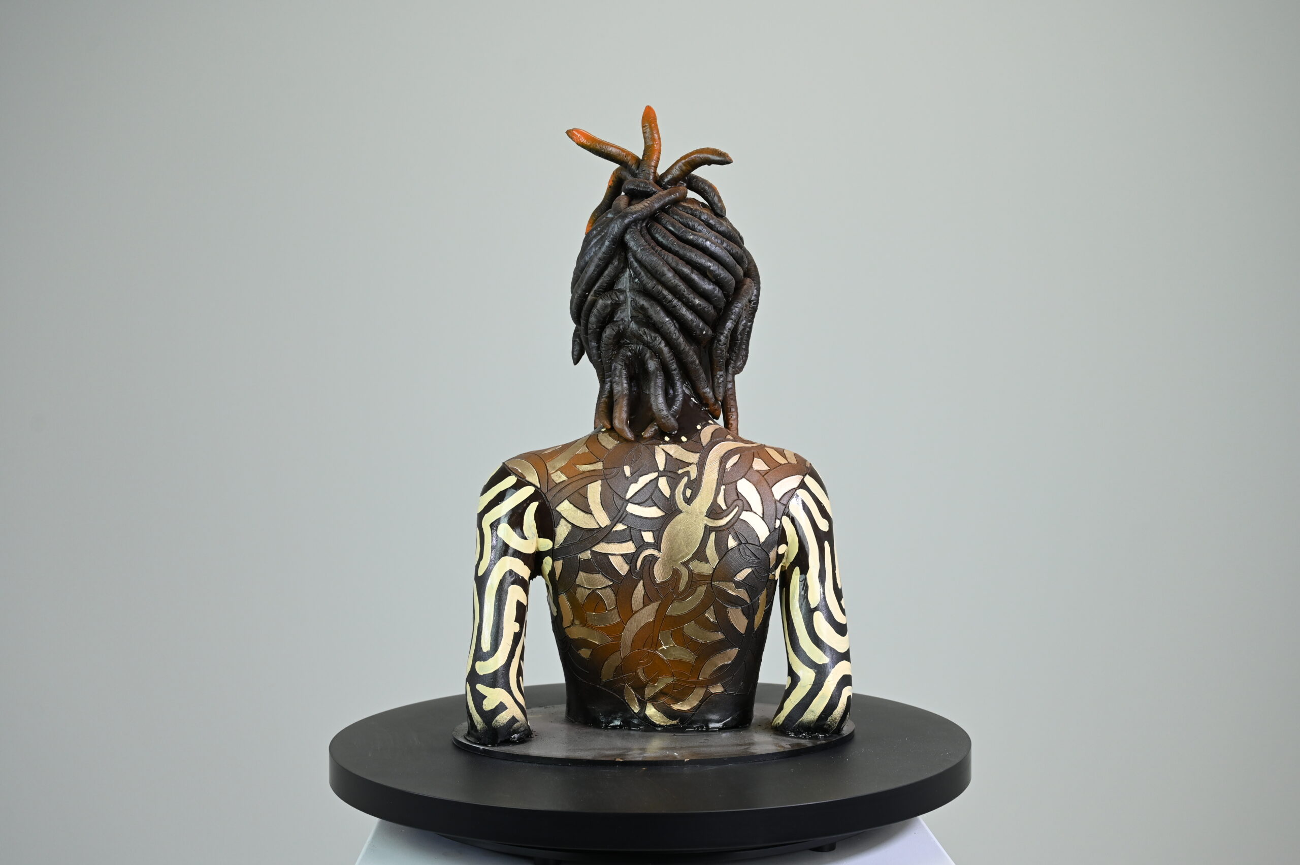 Xolani, back and etching